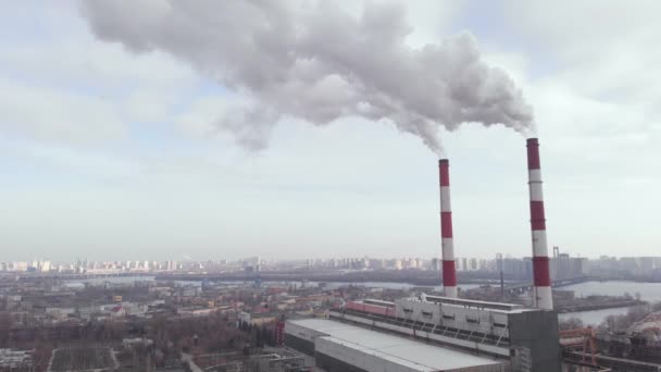 Two pipes plant with smoke. Kyiv. Ukraine. Aerial view — Stock Video