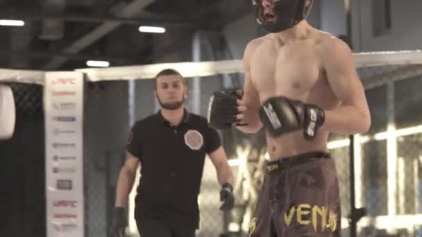 Fight in the MMA octagon. Slow motion. Kyiv. Ukraine — Stock Video