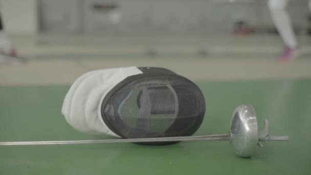 Fencing helmet. Close-up. Slow motion — Stock video