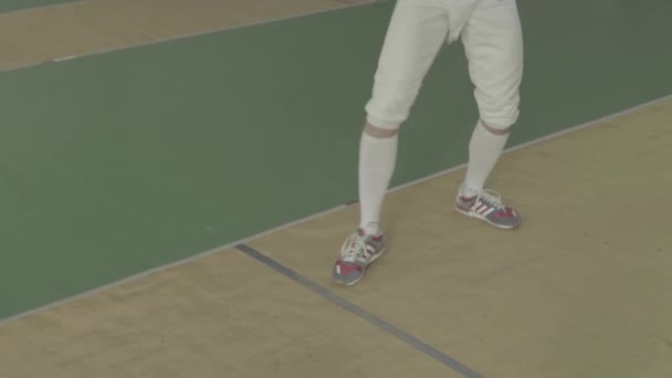 Feet of fencers during fencing. Close-up. — Stock Video