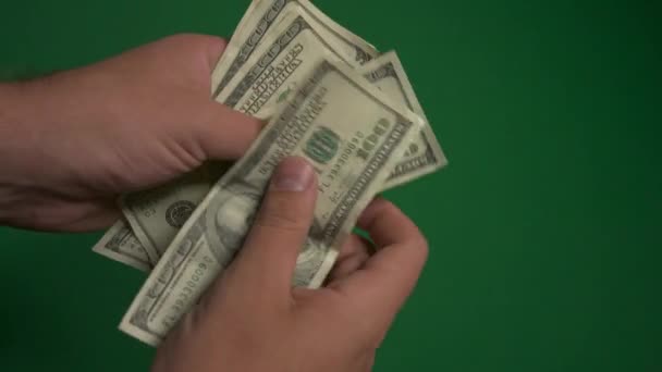 Dollars. American money close-up on a green background hromakey . 100 dollar bills. 4K. UHD. One hundred dollar bills. — Stock Video