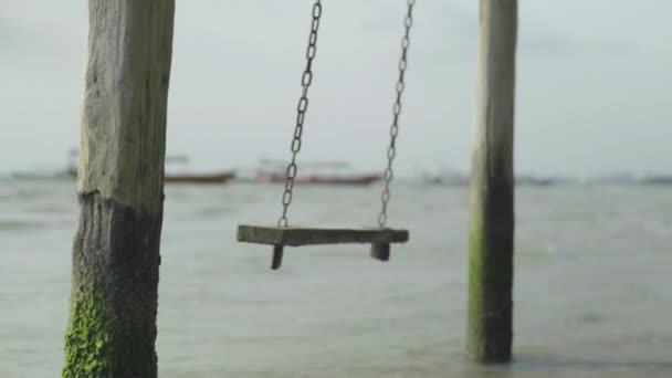 Empty swing in the sea. Sihanoukville. Cambodia. Asia — Stock Video