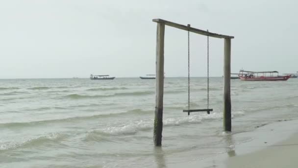 Empty swing in the sea. Sihanoukville. Cambodia. Asia — Stock Video