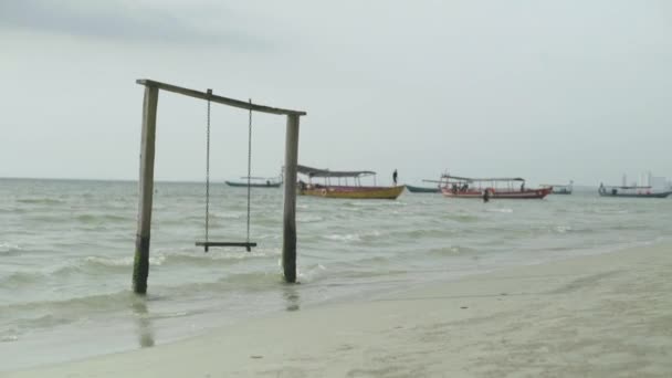 Empty swing in the sea. Sihanoukville. Cambodia. Asia — Stock Video
