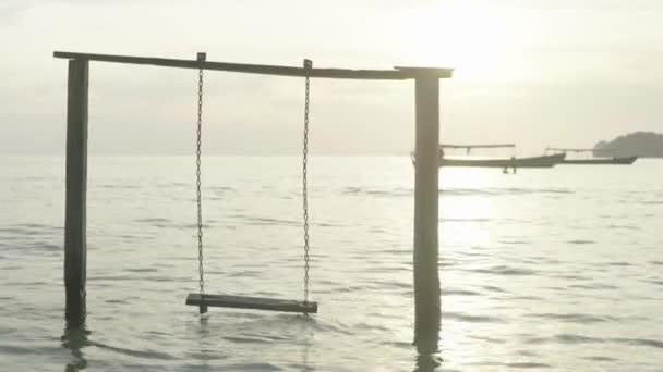 Empty swing in the sea. Sihanoukville. Cambodia. Asia — Stock Video