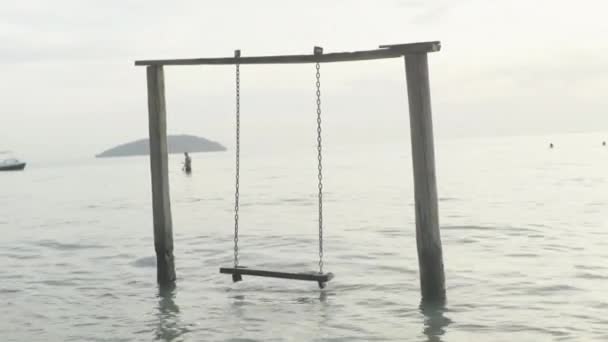 Empty swing in the sea. Sihanoukville. Cambodia. Asia — Stock Video