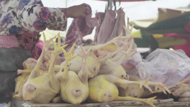 Market in Sihanoukville. Cambodia. Asia. Smoked carcasses — Stock Video