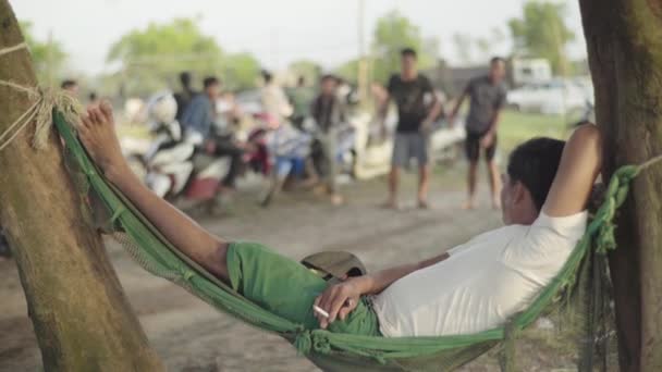 Playing in the iron ball. Sihanoukville, Cambodia, Asia — Stock Video