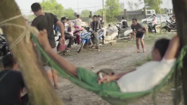 Playing in the iron ball. Sihanoukville, Cambodia, Asia — Stock Video