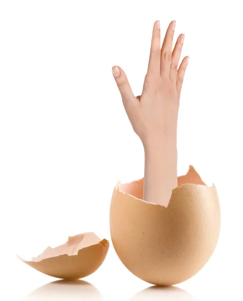 Hand with broken egg isolated on white backround — Stock Photo, Image