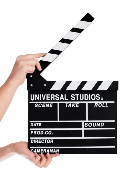 Hands holding a clapper board — Stock Photo, Image