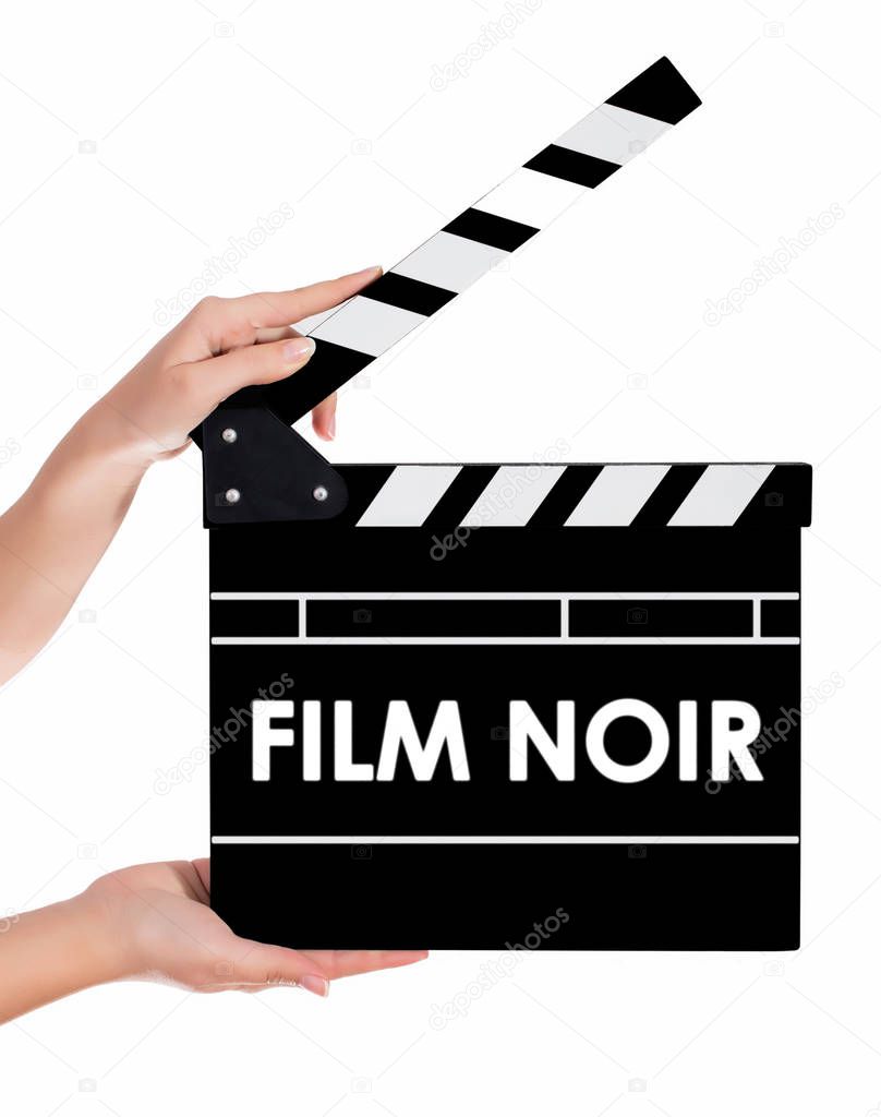 Hands holding a clapper board with FILM NOIR text