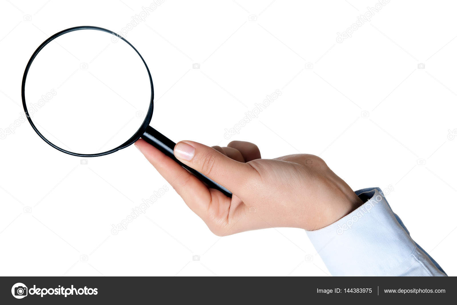 Female hand holding the magnifying glass isolated on white backg