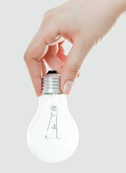 light bulb (lamp) in hand Isolated on white background