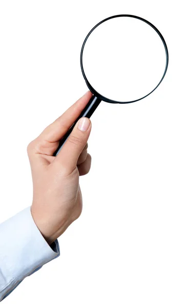 Female hand holding the magnifying glass isolated on white backg — Stock Photo, Image