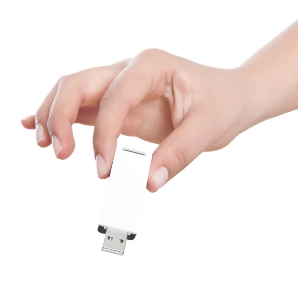 Weibliche Hand hält USB-Stick isoliert auf weiß — Stockfoto