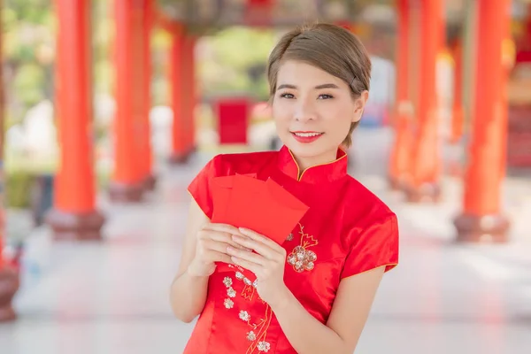 Asian women wearing red dresses,Chinese New Year.