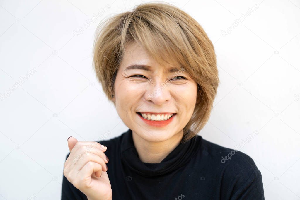 Asian women with wrinkles on the face when smiling and laughing.
