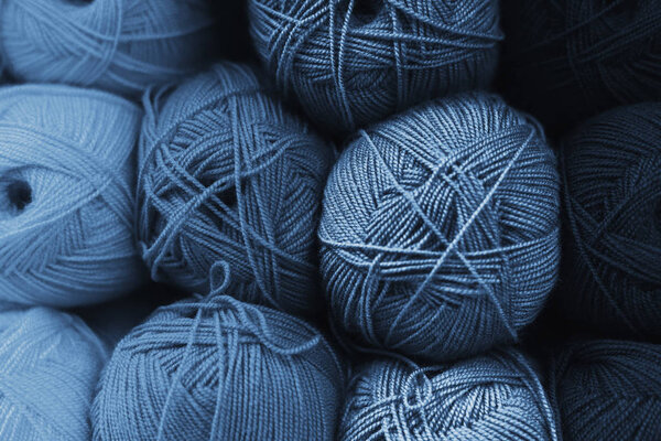 Skeins of wool in all shades of classic blue. Handmade concept. 