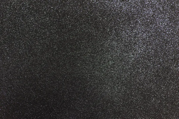 Czarne, błyszczące tło z iskrami. Ciemnoszary abstrakcyjny tło świąteczne — Zdjęcie stockowe