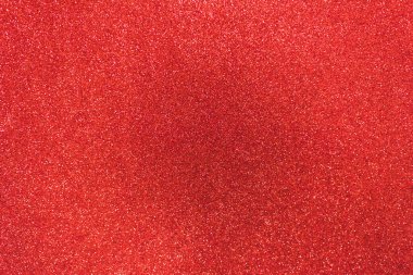 Parıltılı kırmızı bir arka plan. Soyut tatil arkaplanı.