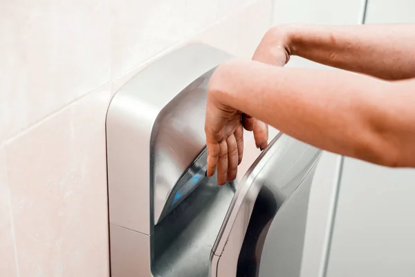 Woman Public Place Dries His Hands Electric Dryer — Stock Photo, Image