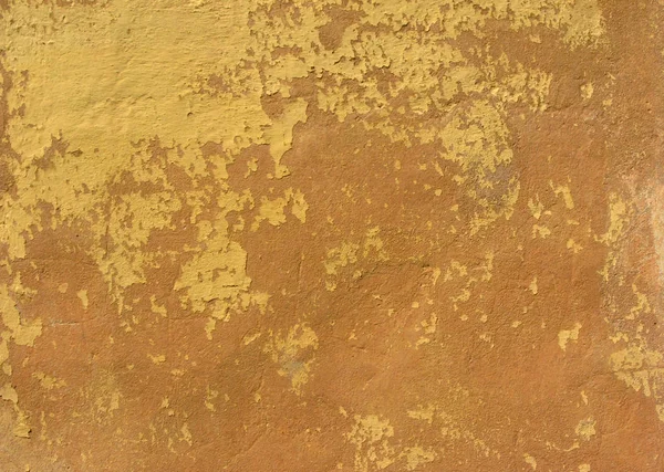 Παλιό κίτρινο καφέ ζωγραφισμένο γύψο υφή τοίχου φόντο. Αφηρημένο φόντο. — Φωτογραφία Αρχείου