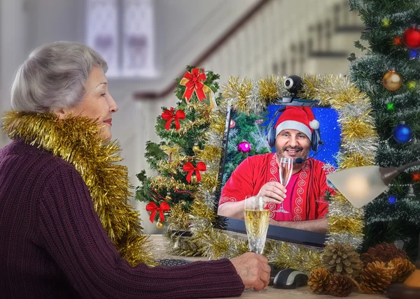 Santa Claus as companion for lonely old woman on Christmas Eve — Stock Photo, Image