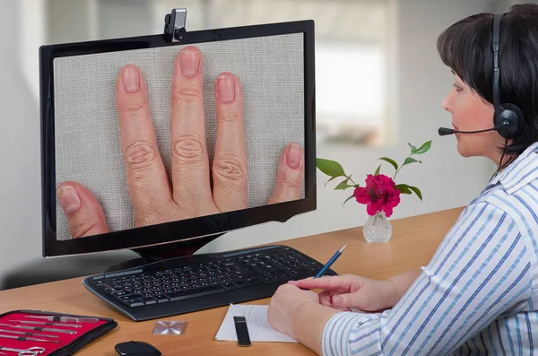 Telemedicine dermatologist looking fingernails — Stock Photo, Image