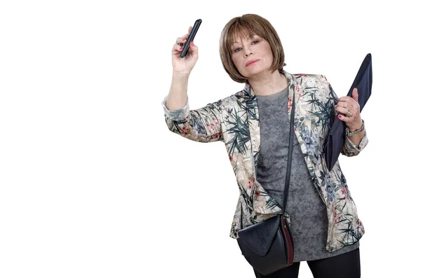 Elegant aged businesswoman catches a taxi — Stock Photo, Image