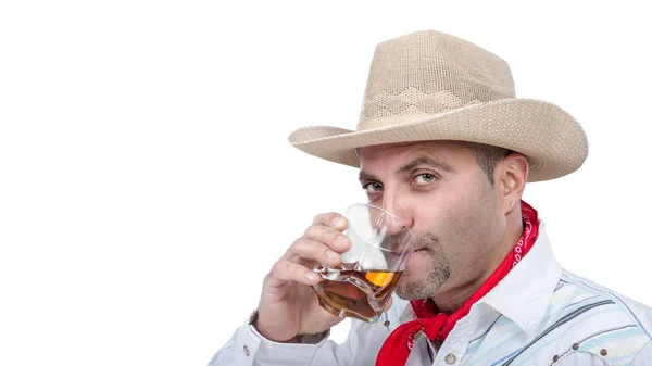 Cowboy enjoying neat whiskey on white background — Stock Photo, Image