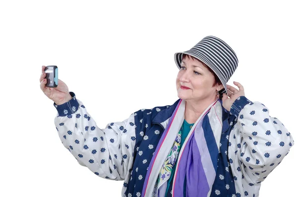 Mujer mayor en chaqueta azul blanco colorido toma foto selfie —  Fotos de Stock