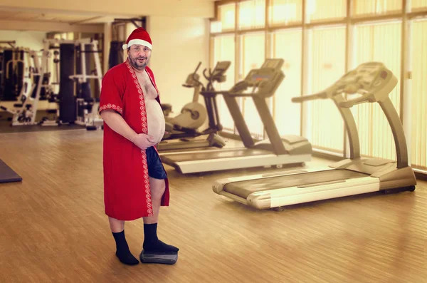 El hombre ganó peso durante la Navidad —  Fotos de Stock