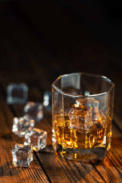 Whiskey in glass with ice