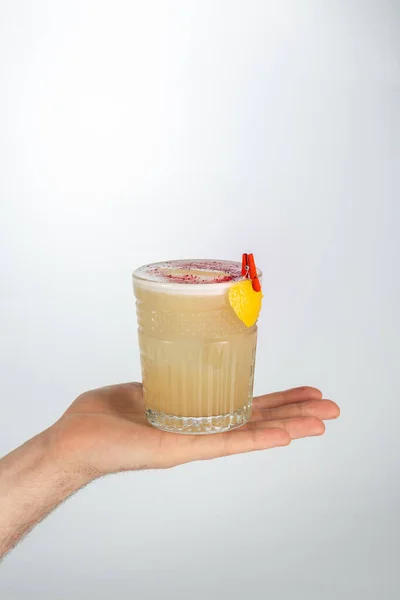 Close Hand Holding Glass Whiskey Sour Cocktail White Background Copy — Stock Photo, Image