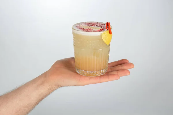 Close Hand Holding Glass Whiskey Sour Cocktail White Background Copy — Stock Photo, Image