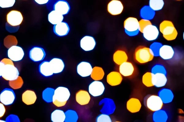 Φωτεινά Και Εστιασμένη Θολή Πολύχρωμα Χριστούγεννα Λαμπερά Φώτα Σκούρο Φόντο — Φωτογραφία Αρχείου
