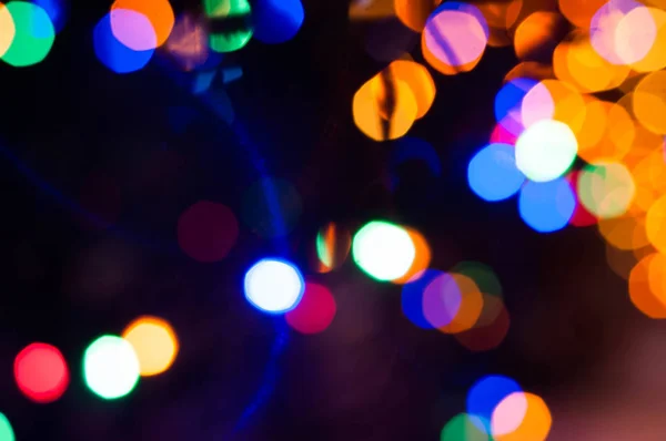 Θολή Defocused Πολύχρωμα Χριστουγεννιάτικα Φώτα Σκούρο Φόντο Bokeh Αποτέλεσμα Για — Φωτογραφία Αρχείου