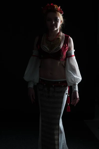 Illuminated Silhouette Woman Traditional Folk Slavic Costume Dance Looking Camera — 스톡 사진