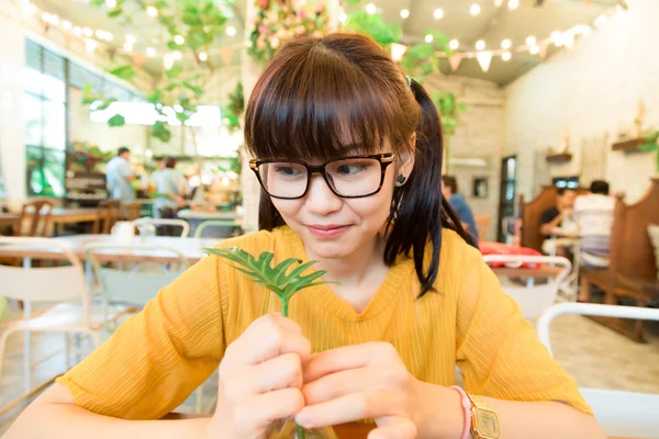 Asian hipster nerd glasses women sitting at the coffee shop — Stock Photo, Image