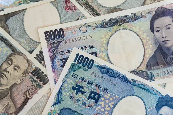 1000 and 5000 Japanese currency notes background