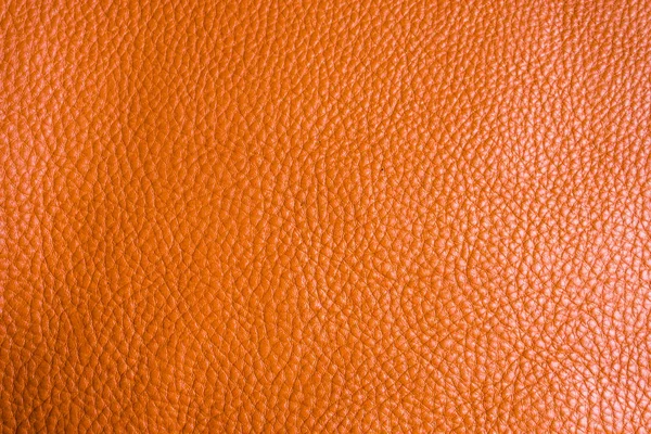 Genuine full grain leather tan color colose up background