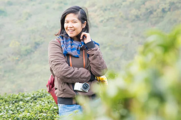 Asian tourists woman enjoy in tea plantations