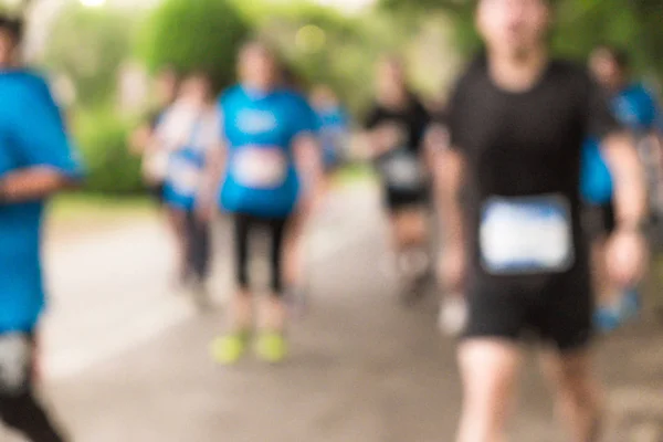 Blurry running people in maratona velocità astratta — Foto Stock