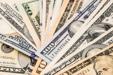 10 ve 100 ABD Doları banknot kapatın Finans arka plan