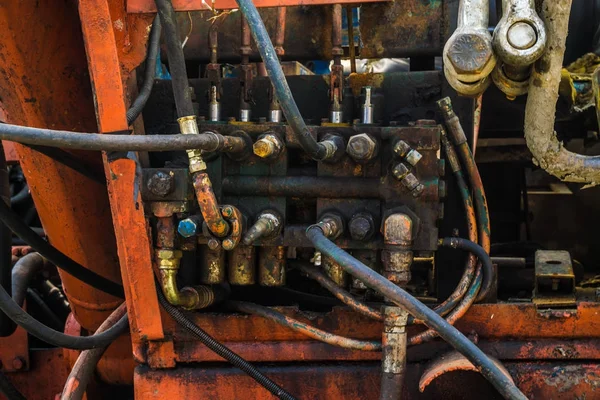 Hydraulic fittings and levers machine on control panel — Stock Photo, Image