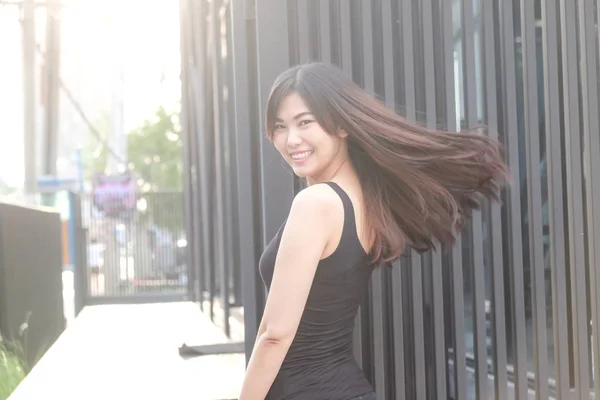 Beautiful Women Flick Healthy Long Hair While Sunset Light Street — Stock Photo, Image