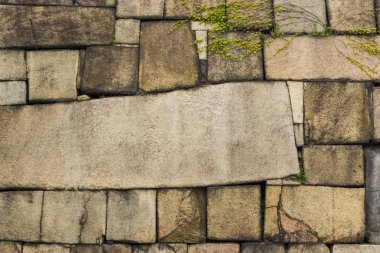 Eski büyük taş tuğla duvar parçası taştan