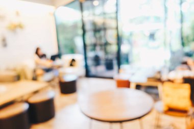 Vintage kafe iş için konuşurken oturan bulanık insanlar