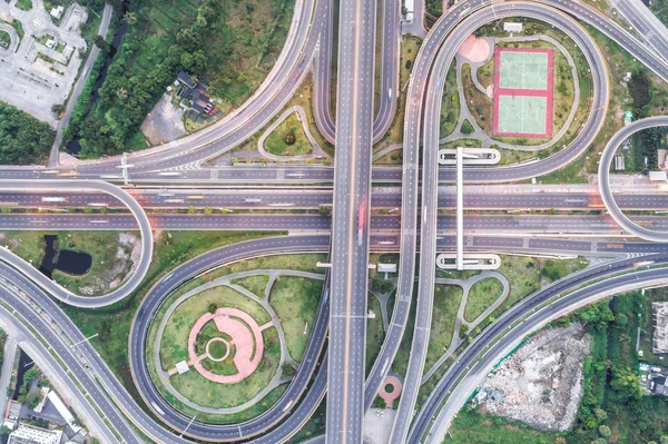 Overpas traffic intersection road topview with green tree in the morning, Transport concept